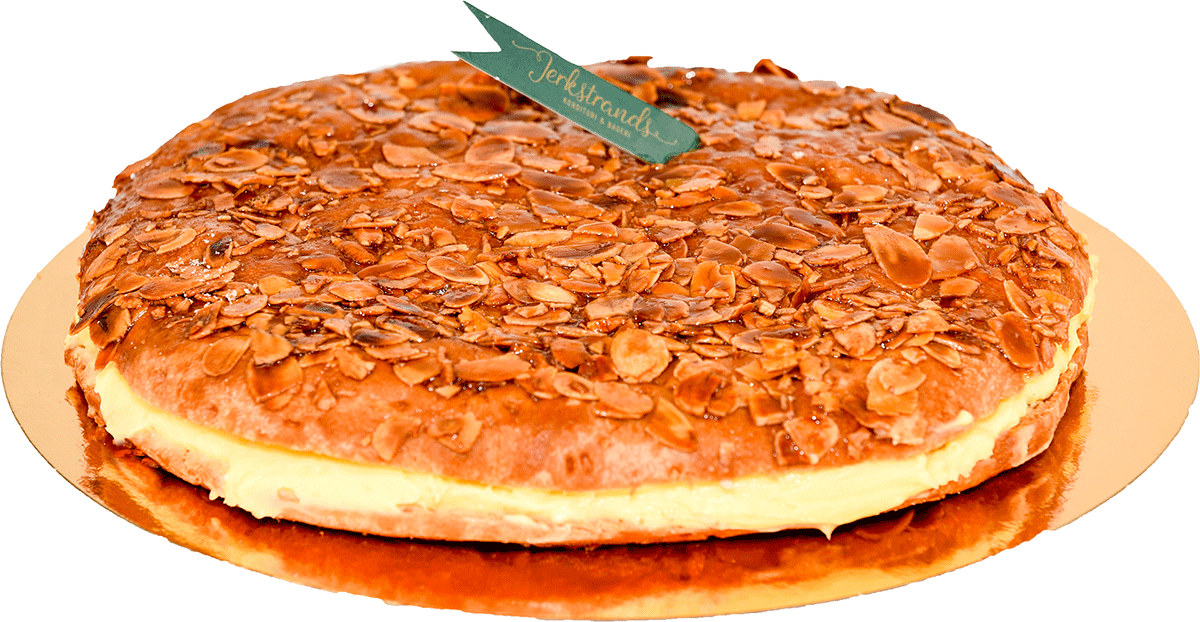 Mjuk, saftig wienerdeg toppad med karamelliserade mandlar som knastrar under tänderna och en gyllene, ljuvlig glasyr. Varje tugga är en perfekt balans mellan smör, sötma och nötighet – fikaälskarens dröm!